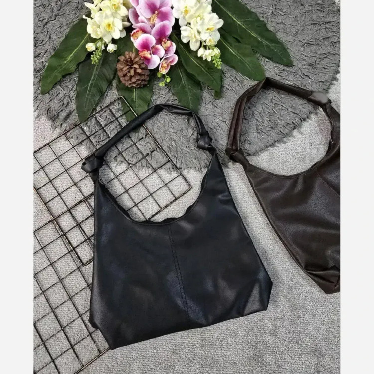 کیف دوشی زنانه چرمی بند گره ای مدل سبک و جادار ابعاد 30 در 40 سانتی متر