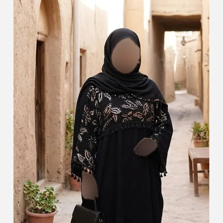پیراهن زنانه مدل زرگل جنس کرپ الیزه مشکی سایز بزرگ 38 تا 60 با خرجکار پولکدوزی و منگوله قد 140