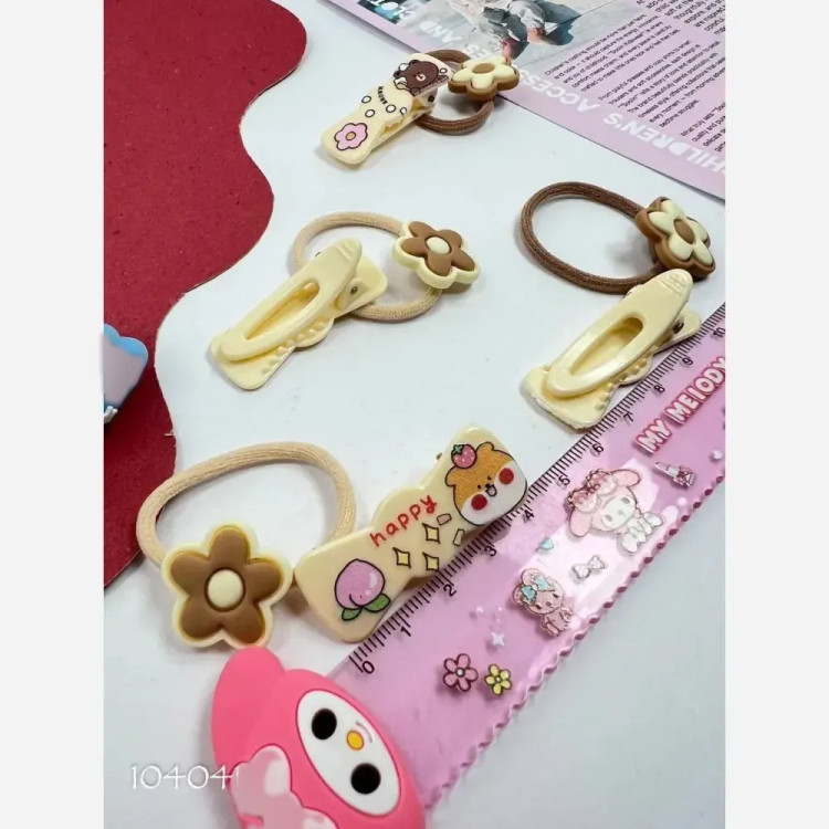 پک 4 عددی اکسسوری مو دخترانه شامل 2 عدد کش مو و 2 عدد گیره انبری وارداتی