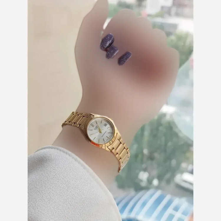 ساعت مچی کاسیو بند استیل طلایی صفحه سفید تقویم دار زنانه و مردانه با جعبه کادویی