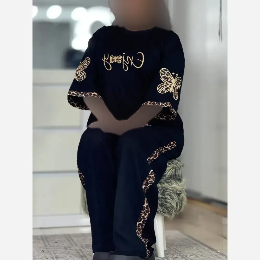 ست تیشرت و شلوار زنانه مدل گیلدا جنس پنبه گلکسی رنگ مشکی فری سایز 38 تا 46