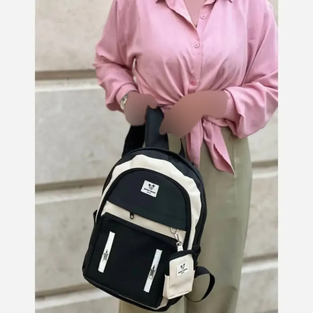 کوله پشتی زرین دیبا ضد آب با کیفیت عالی و سه زیپ و جای قمقمه اندازه 40*28 سانت مشکی کرم و تمام مشکی