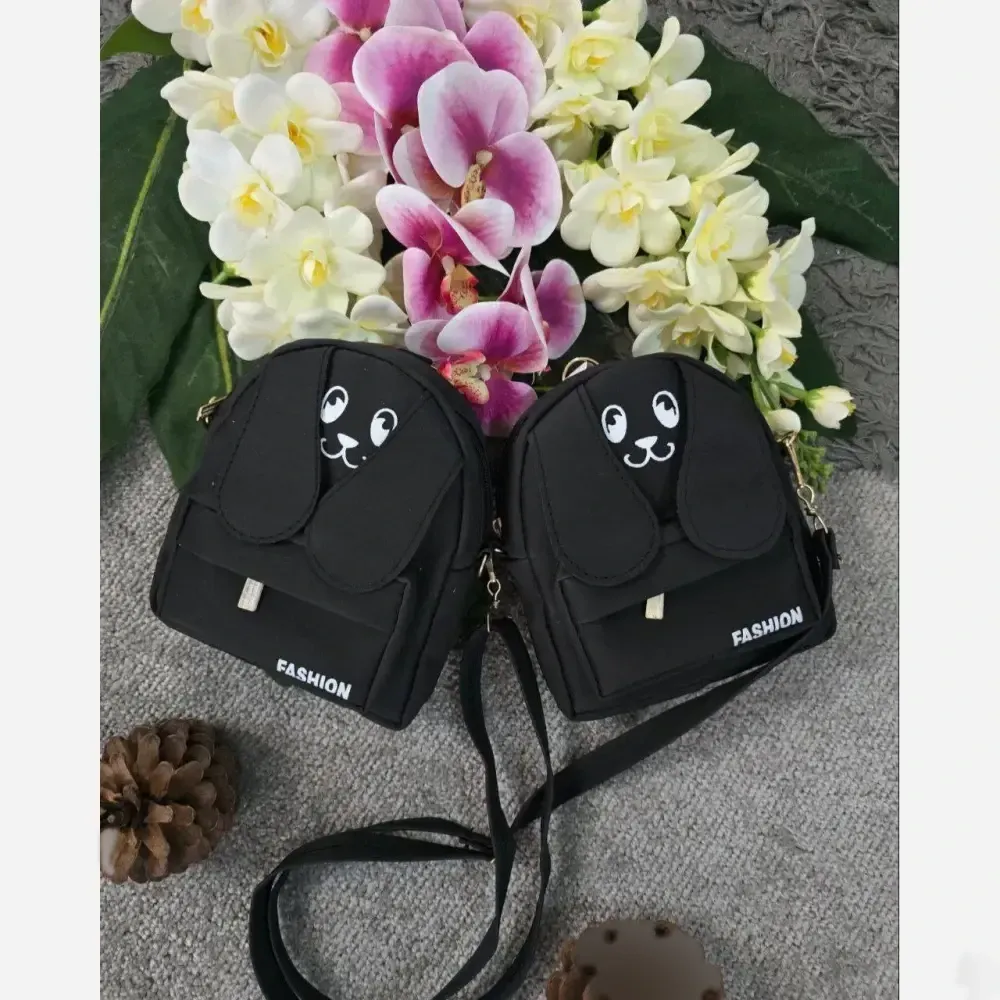 کیف چرمی مژگان زنانه جادار با بند بلند
