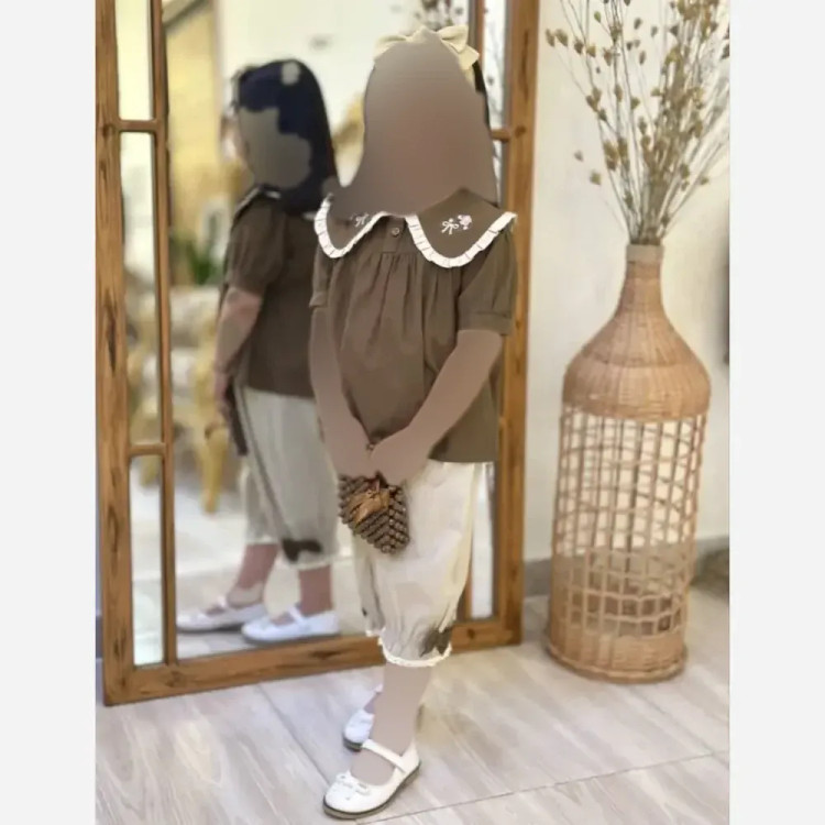 ست تیشرت و شلوار بچگانه پروانه نگین دار مشکی مناسب 7 تا 13 سال جنس پنبه و دورس پنبه